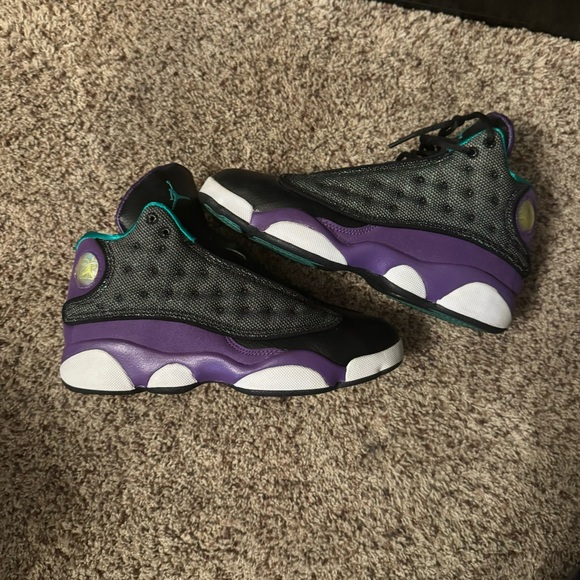 Air Jordan 13 Retros in a black, purple, and teal colorway - Picture 2 of 9